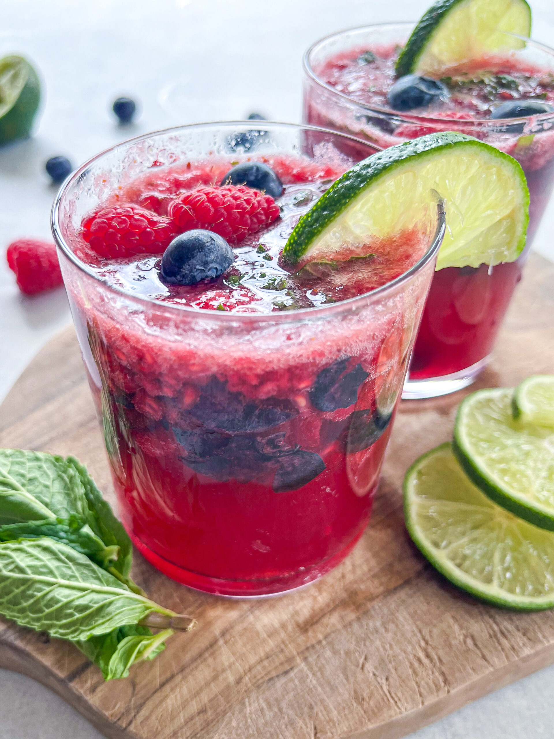 Berry mocktail on a cutting board. 