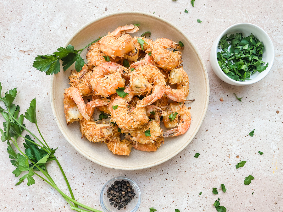 Paleo healthy coconut shrimp in white bowls