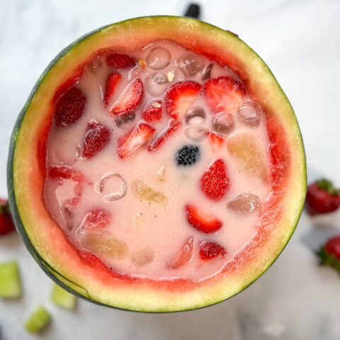 Subak-Hwachae in a watermelon punch bowl birds eye view.