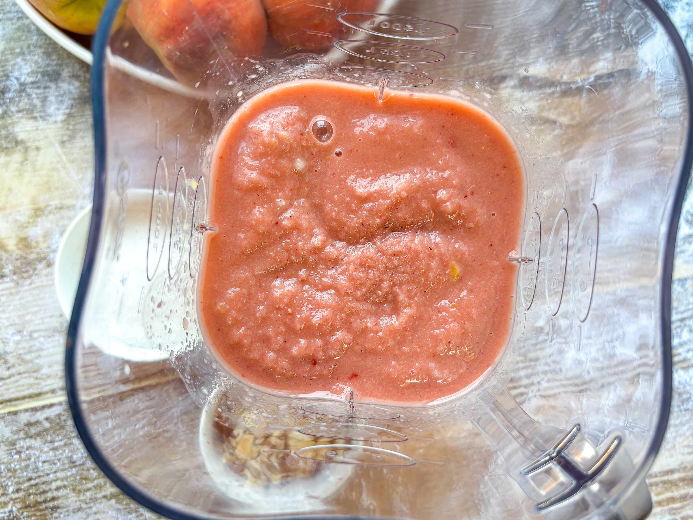 Unfrozen peach sherbet in a blender